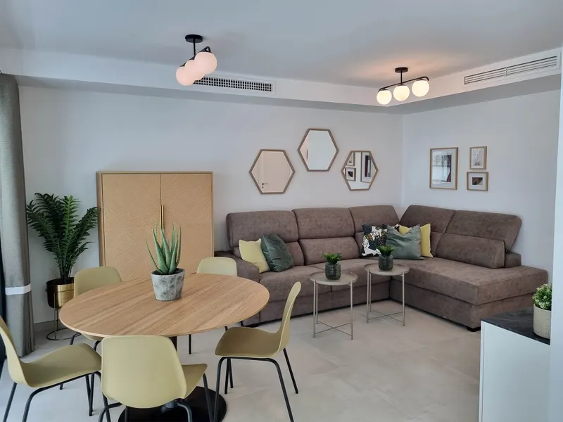 Sofa and dining area in the living room